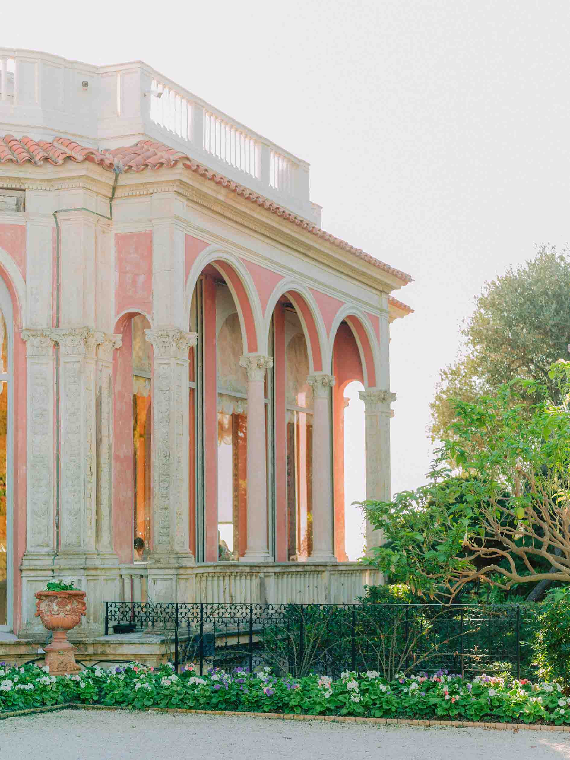 Pink loggia and Renaissance-inspired arches at Villa Ephrussi de Rothschild